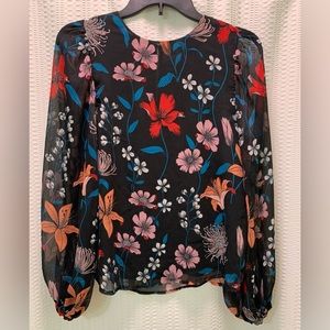 Gorgeous floral blouse with sheer balloon sleeves by Who What Wear.